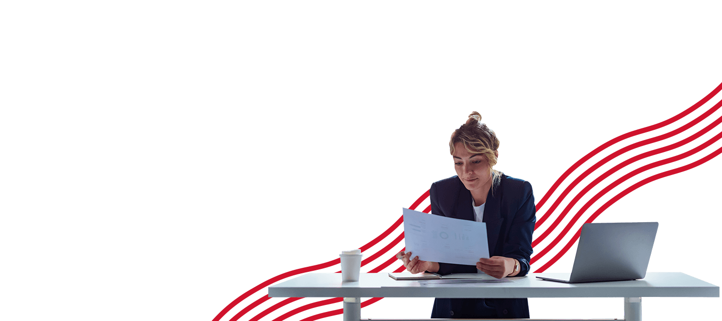 Woman looking at printed paper